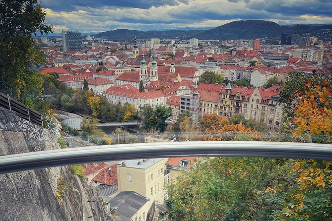 Graz Funicular Ride and Schlossberg Picnic Experience - Hackher Lion and the military story of Schlossberg