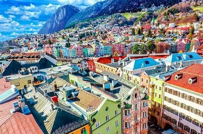 Self-Guided 1,5-hour Tour of Innsbruck: Exciting Stories, Photo Spots & Desserts - Maria-Theresien-Strasse shows modern Innsbruck