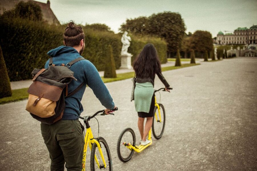 Vienna: Guided Tour by Kick Bike or E-Scooter with a Local - Danube Island and a local view of city life