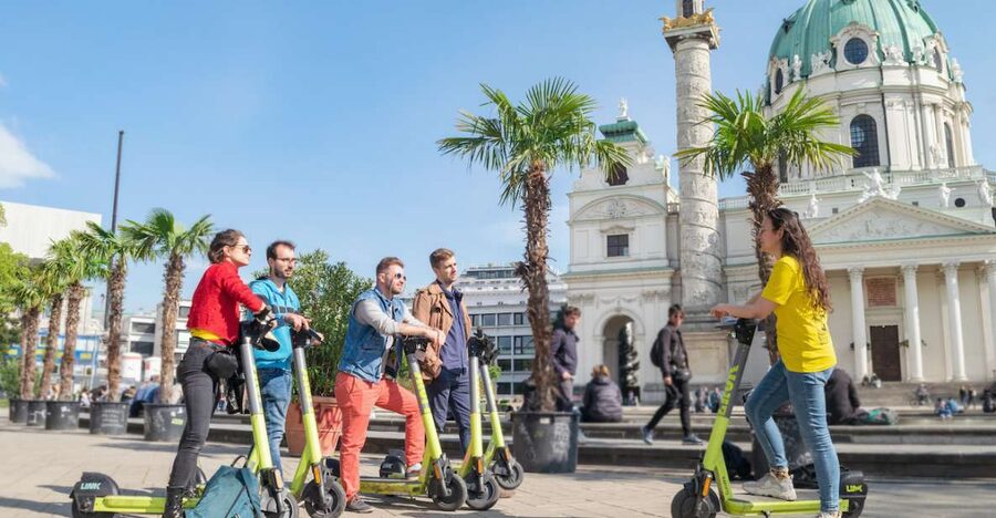 Vienna: Guided Tour by Kick Bike or E-Scooter with a Local - Meeting under the yellow Prime Tours umbrella