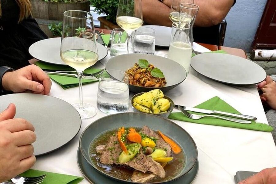 Vienna Nightlife: Food, Wine, Cocktails and Rooftop Bar Tour - Dinner with tafelspitz, schnitzel, or a vegetarian dish