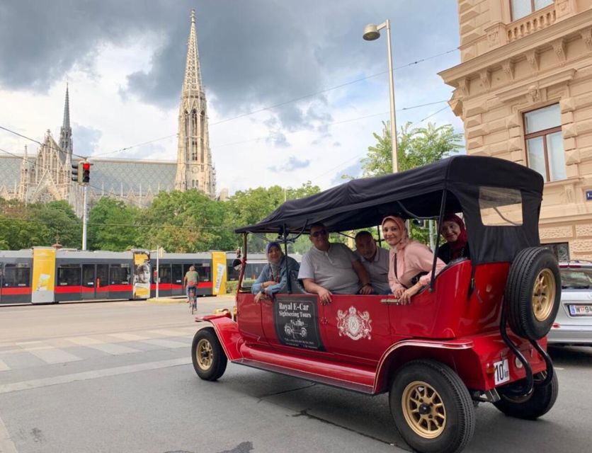 Vienna: Private Electric Car Sightseeing Tour - Churches, cafés, and smaller central streets